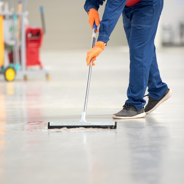 person mopping floor