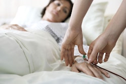 Woman in hospital with IV