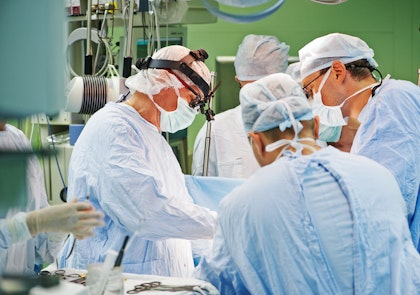 Operating room, patient and staff