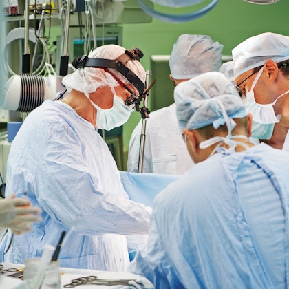 Operating room, patient and staff