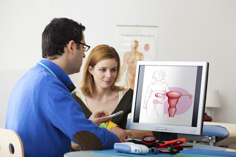 Female fertility patient meeting with doctor
