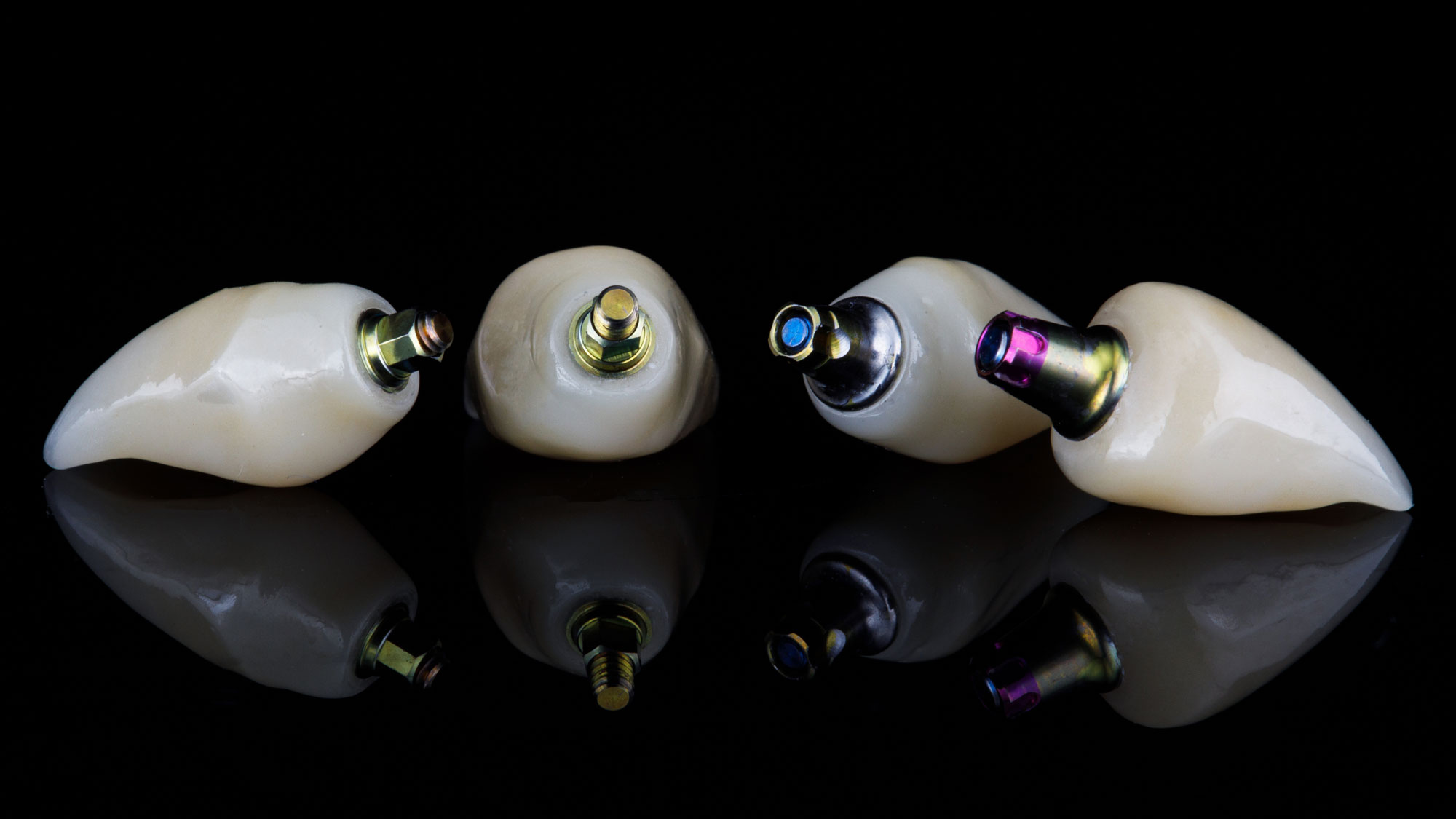 four implant-supported crowns