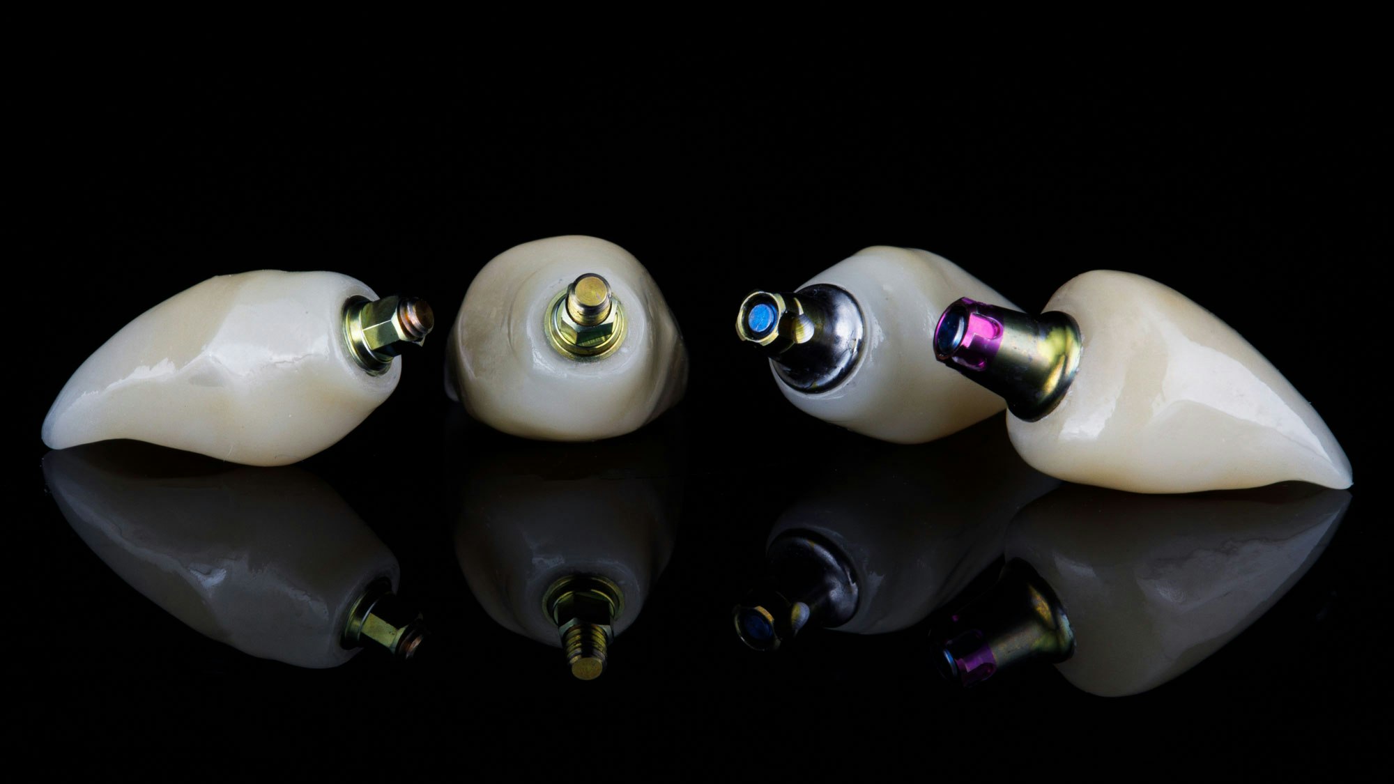 four implant-supported crowns