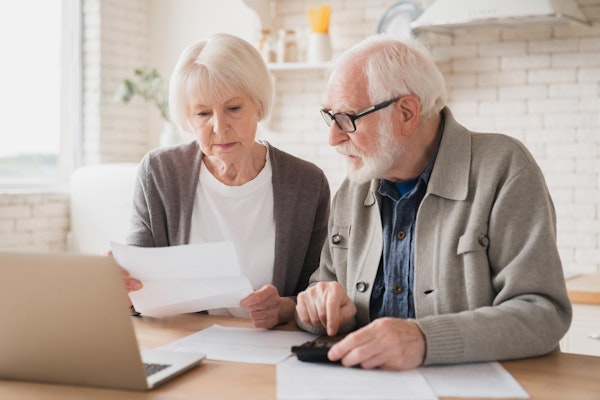 Couple looking at insurance plans