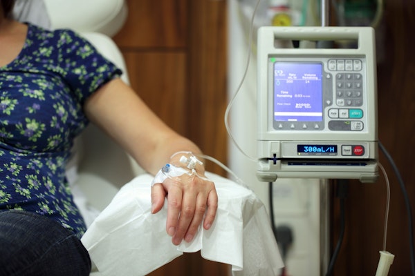 woman receiving IV sedation