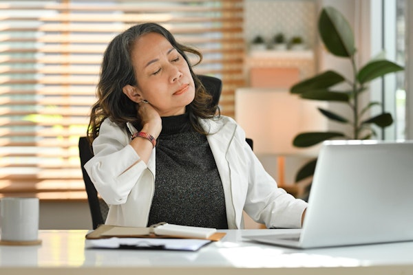 Business Woman with sore neck