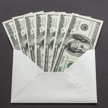 hundred-dollar bills in envelope