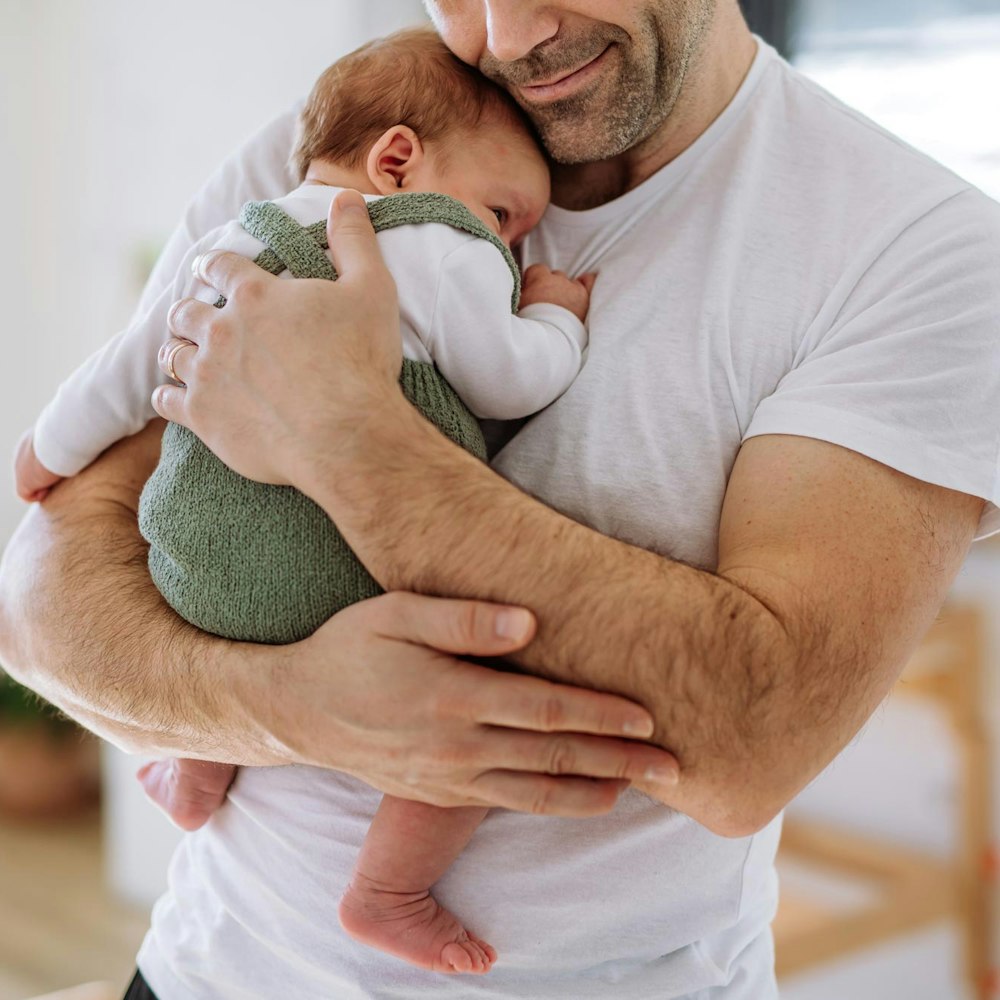 Father holding baby