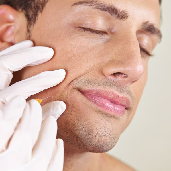 Man receiving BOTOX Cosmetic treatment