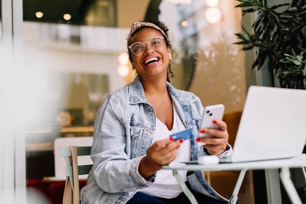 Smiling woman about to make a payment