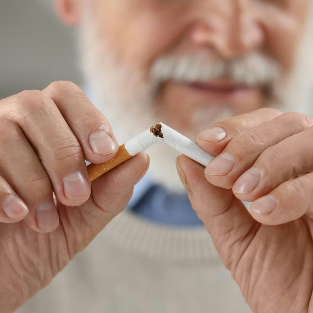 Mature man broke cigarette