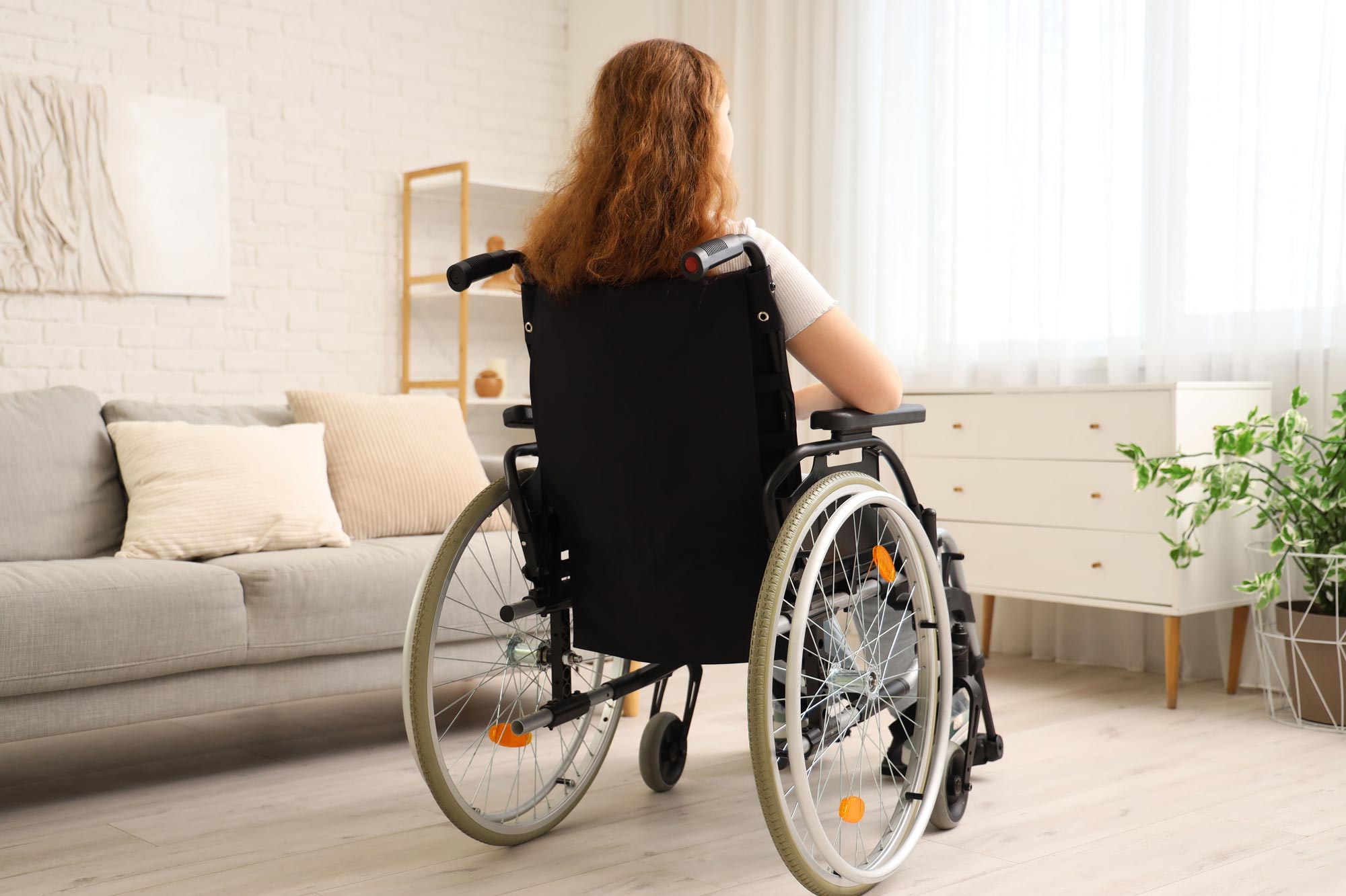 A woman in a wheelchair