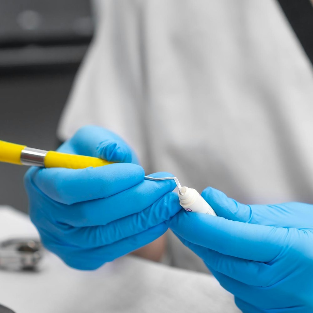 Dentist using composite material for dental filling