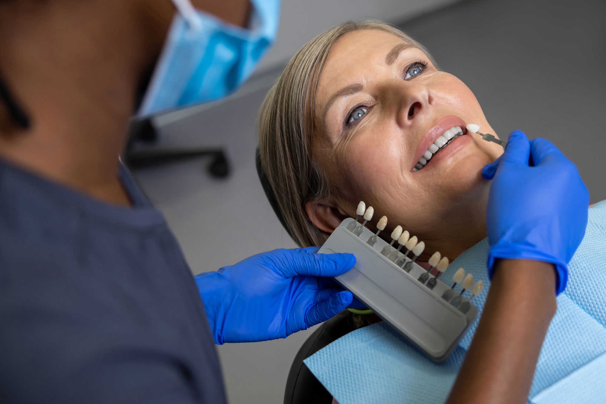 Veneer shade being compared to teeth