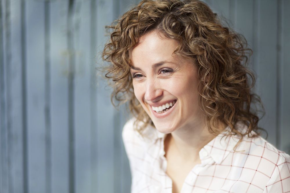 Lady smiling after facelift