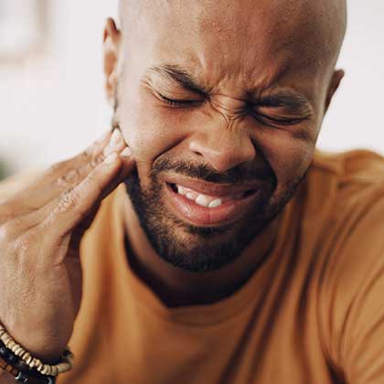Man with a painful toothache