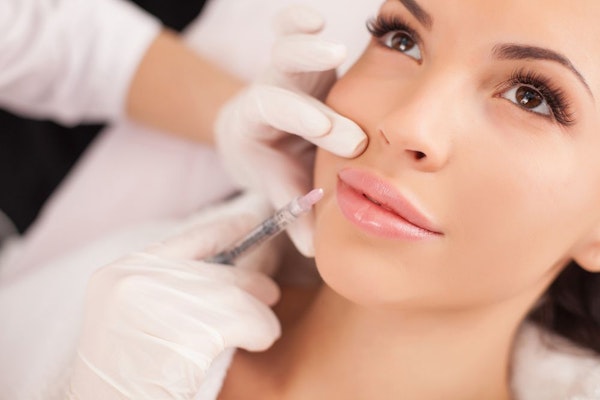Woman receiving BOTOX injections