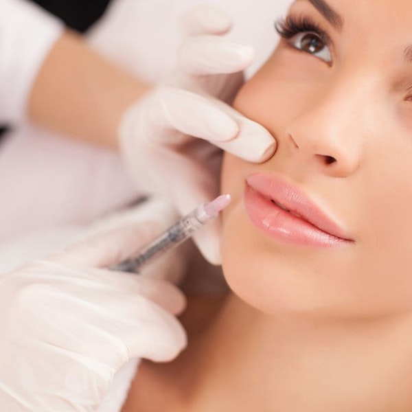 Woman receiving BOTOX injections