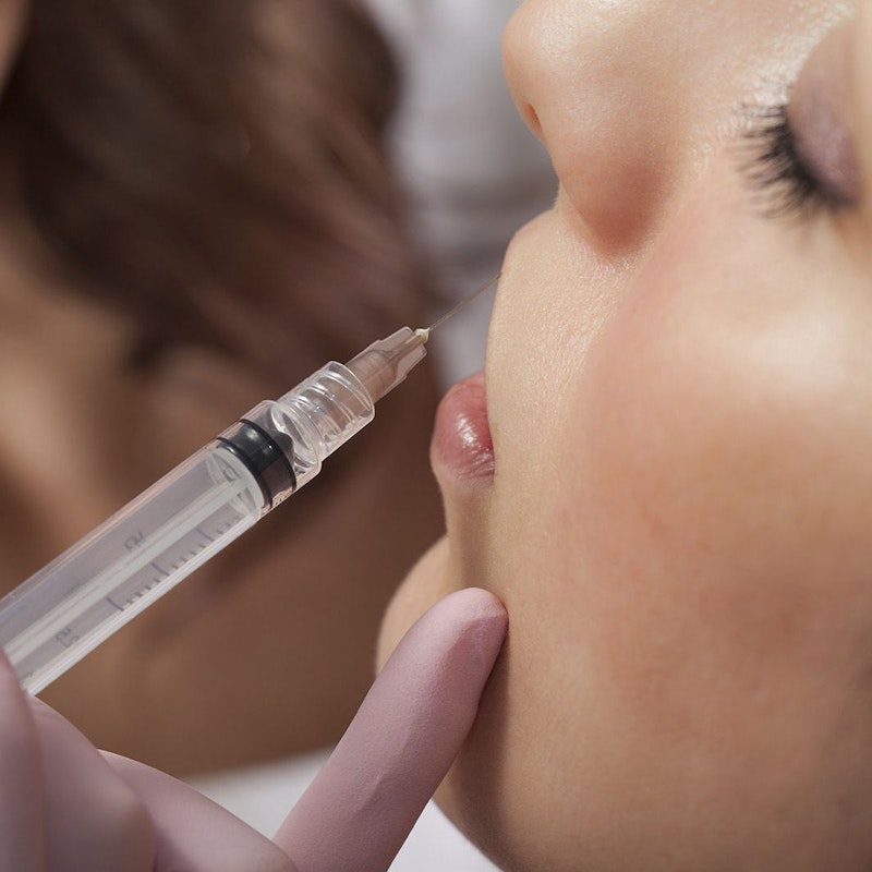 Woman getting injectable treatment