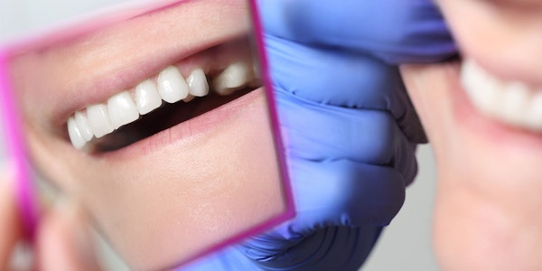 Person with missing tooth