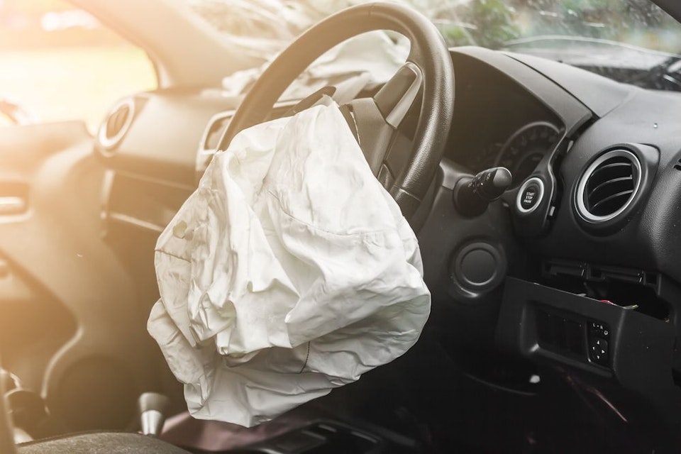 An deployed airbag after an accident