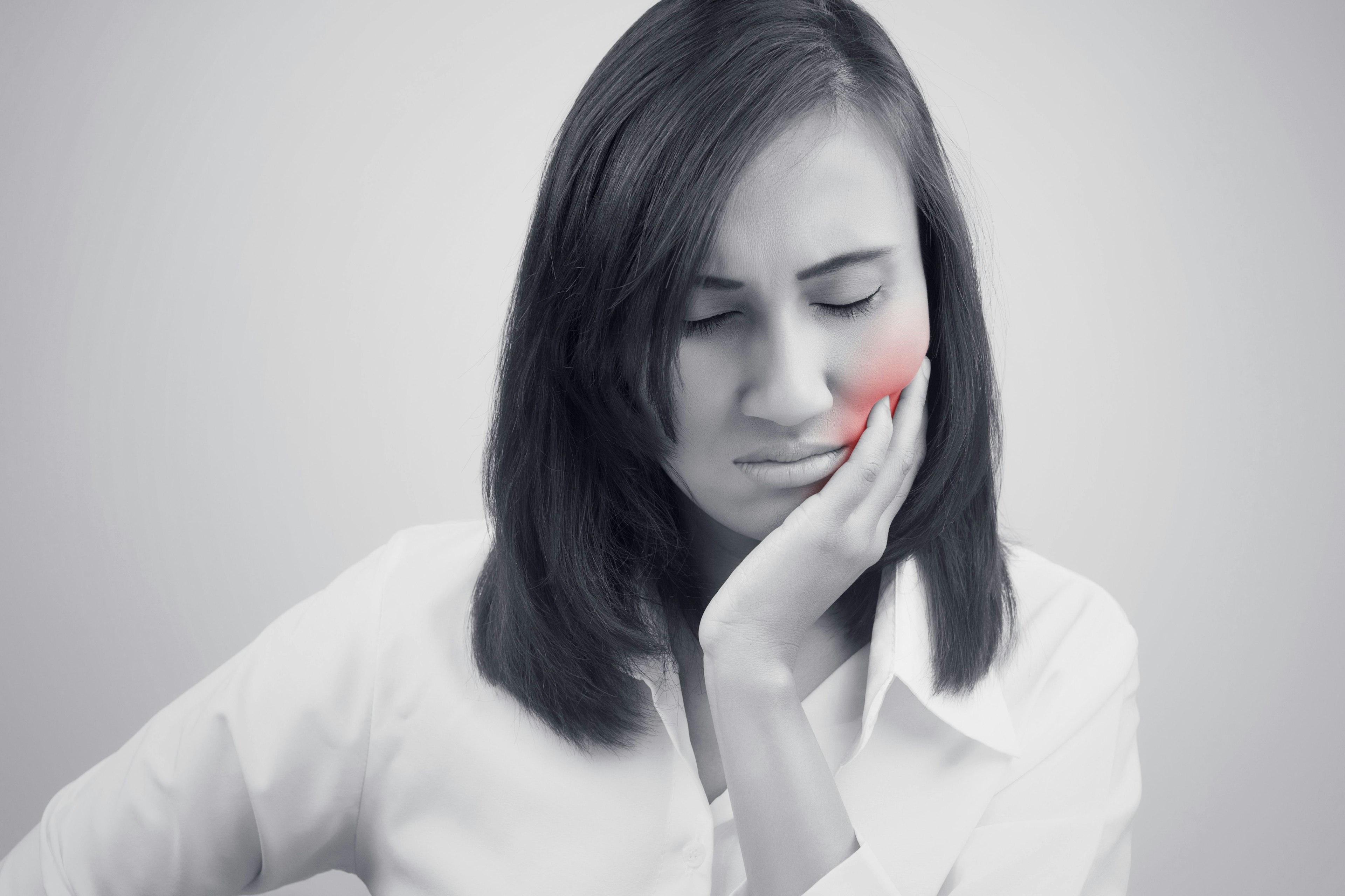 Woman with tooth pain