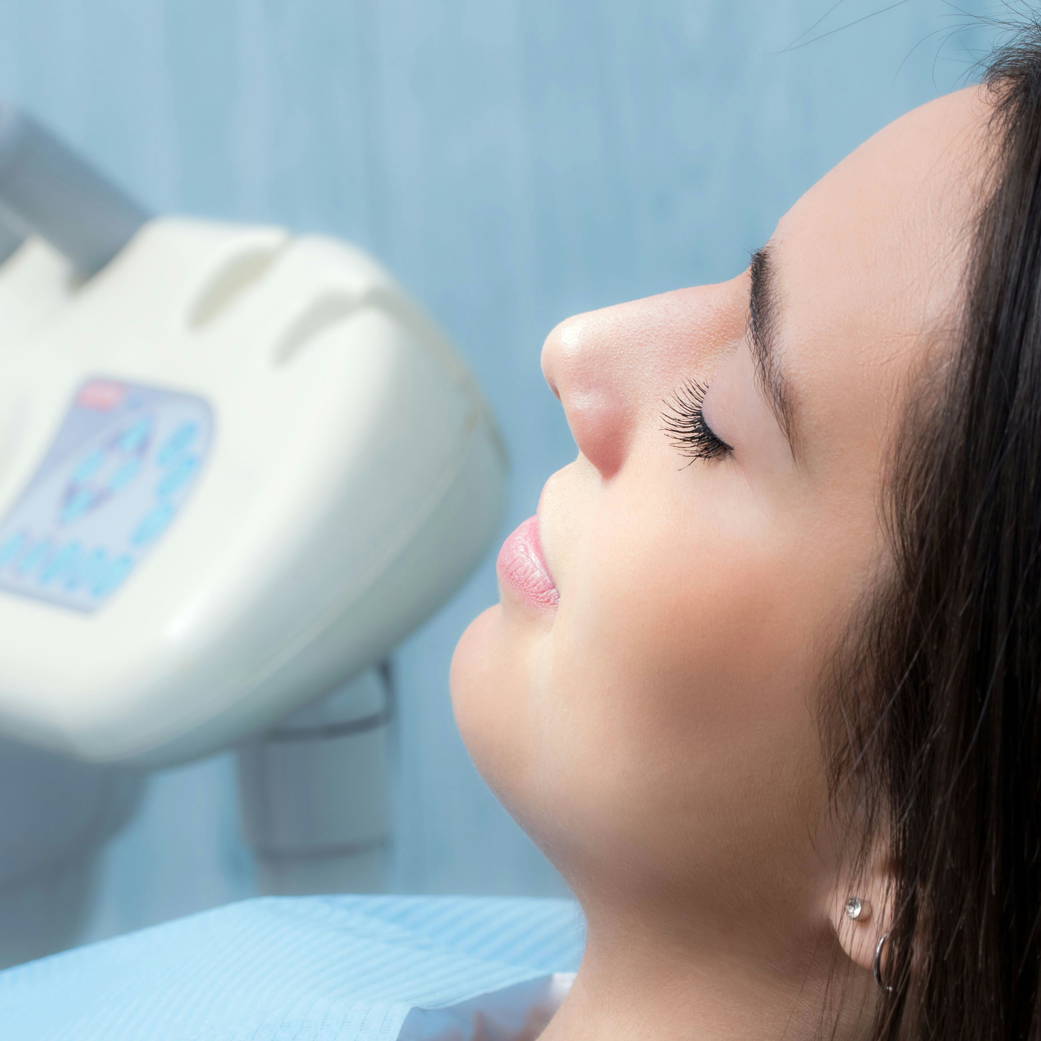 Woman with eyes closed