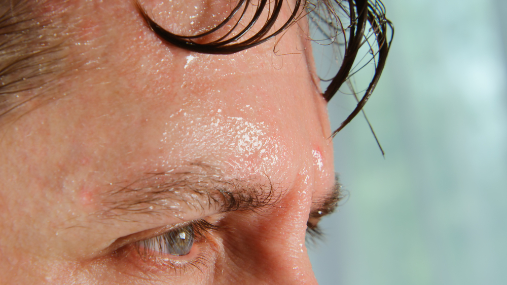 Individual sweating in the hot summer weather
