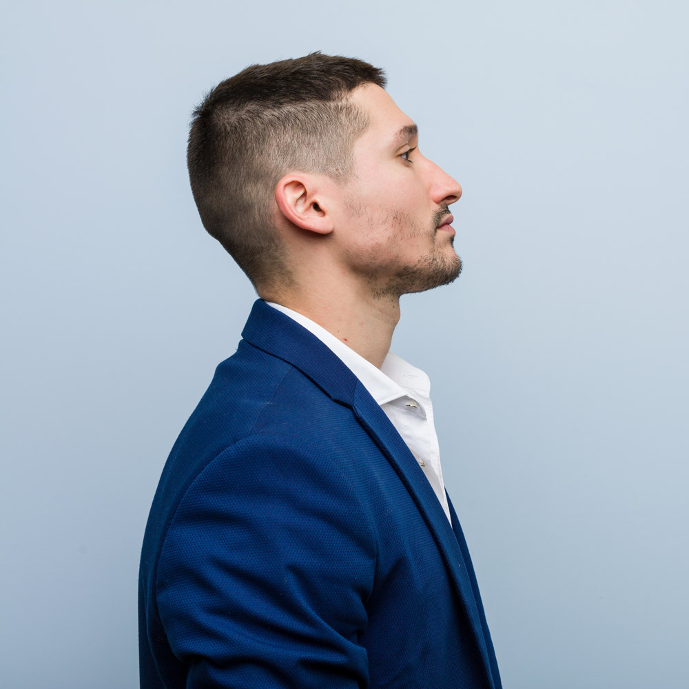 Side profile of man in suit