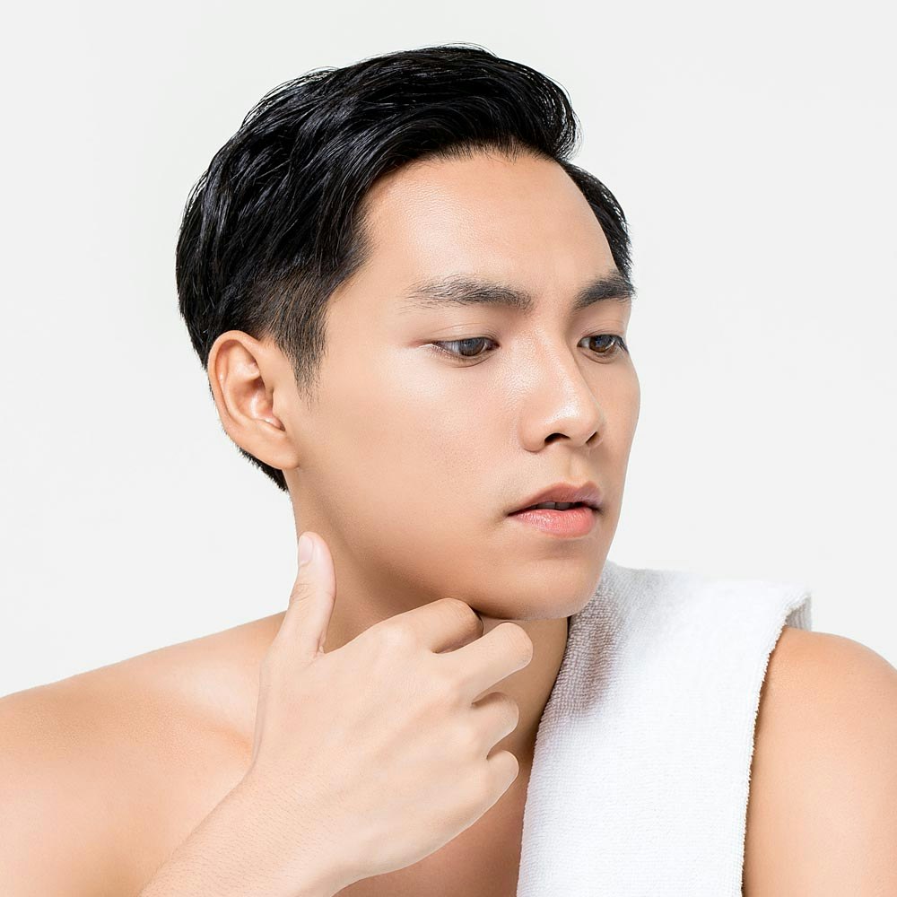 Man observing his laser facelift