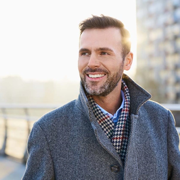 Man smiling outdoors