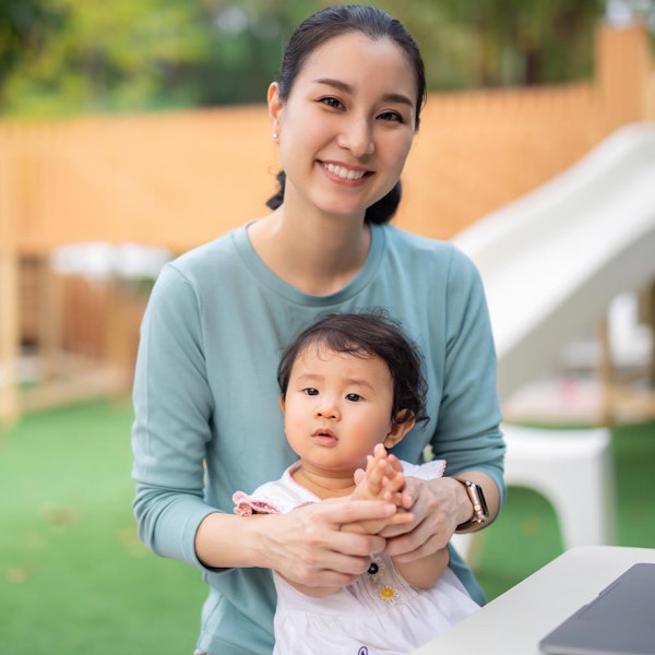 Smiling mother and baby