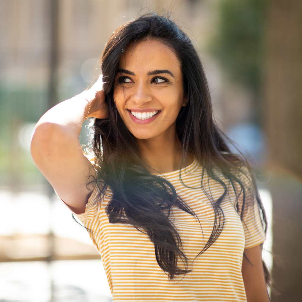 Smiling woman after smile makeover