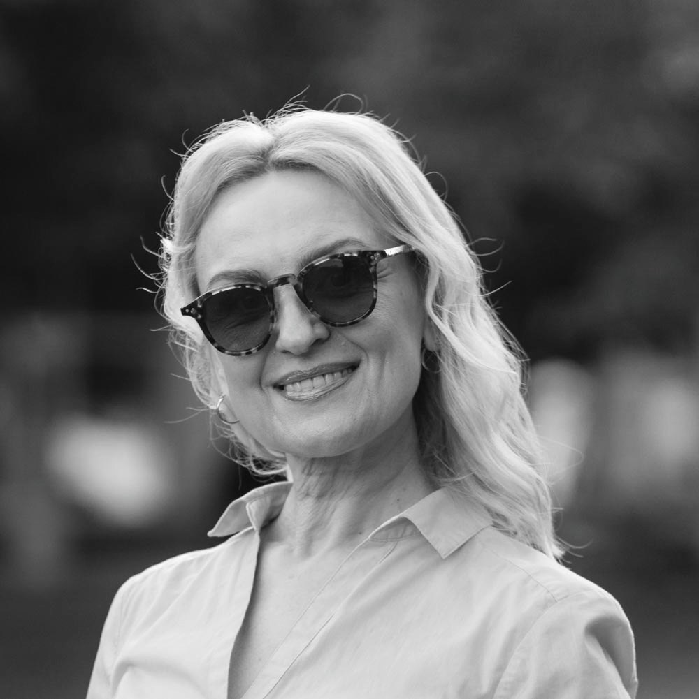 Smiling woman wearing sunglasses