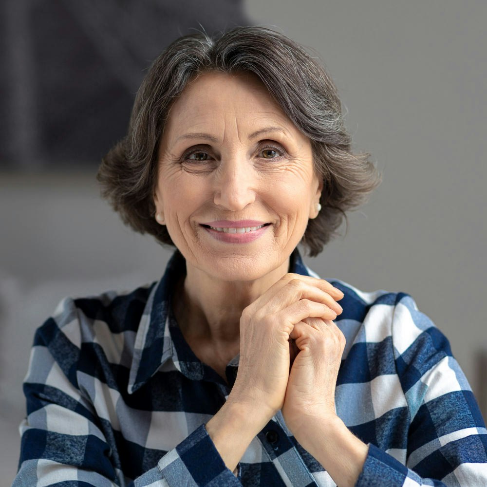 Older Hispanic woman smiling