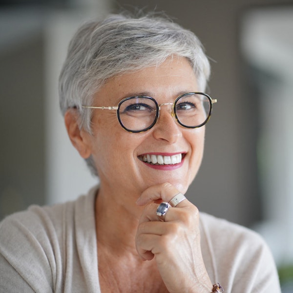 Smiling woman after gum contouring
