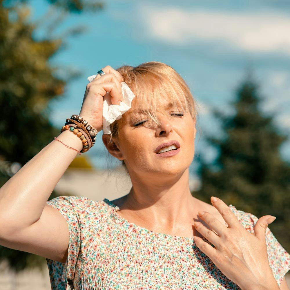 Woman sweating
