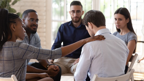 Man sharing during in a substance abuse group