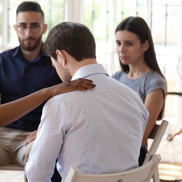 Man sharing during in a substance abuse group