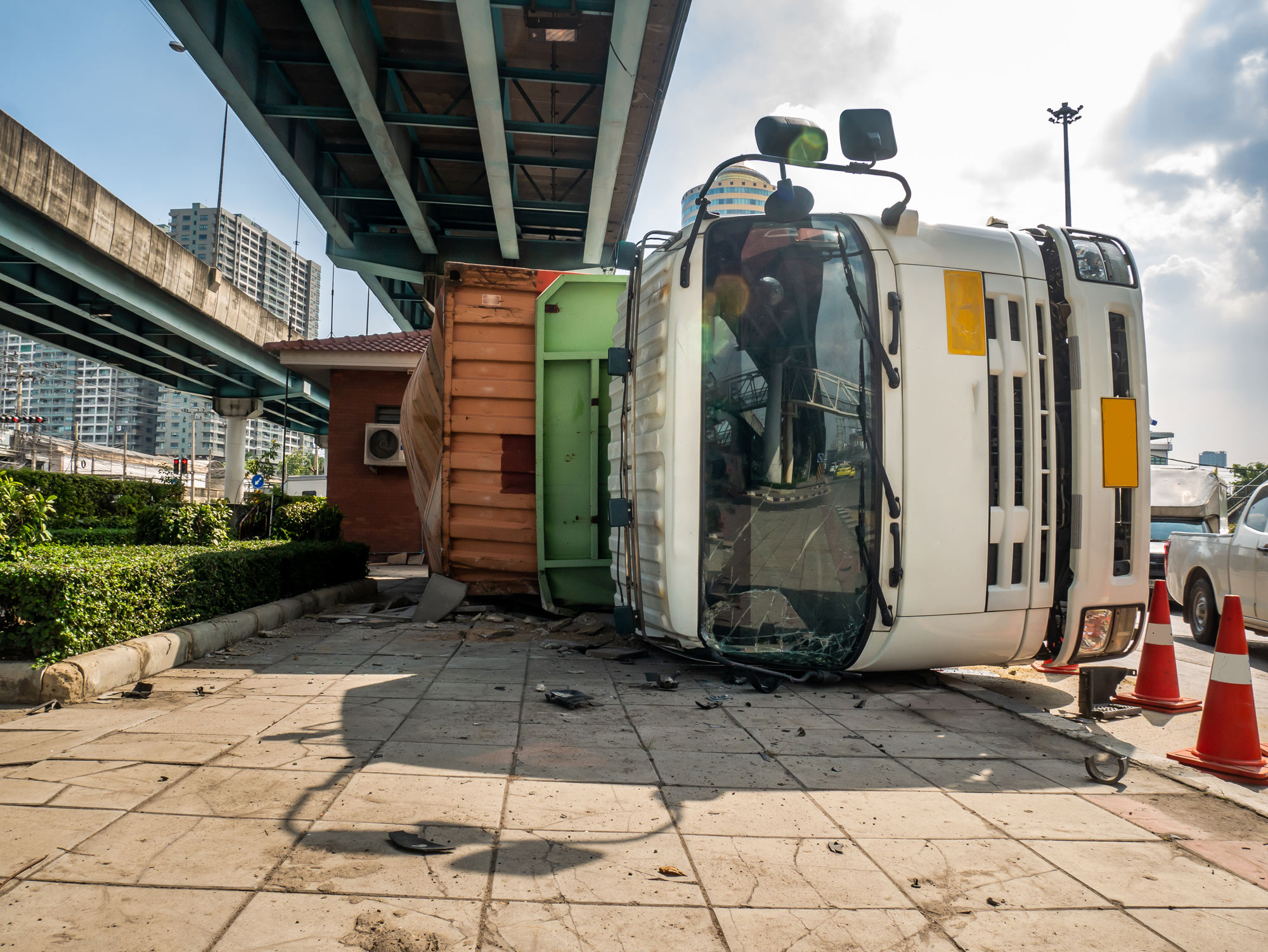 Truck on its side in the city