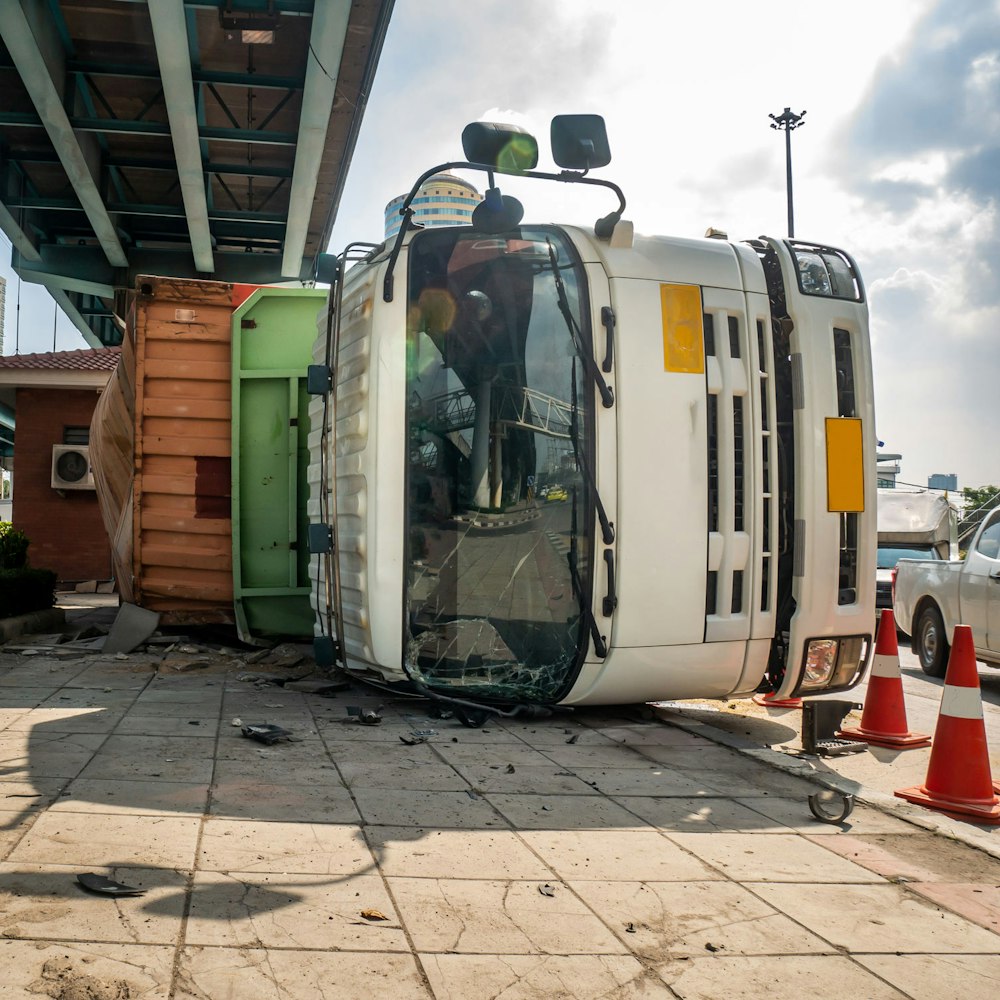 Truck on its side in the city