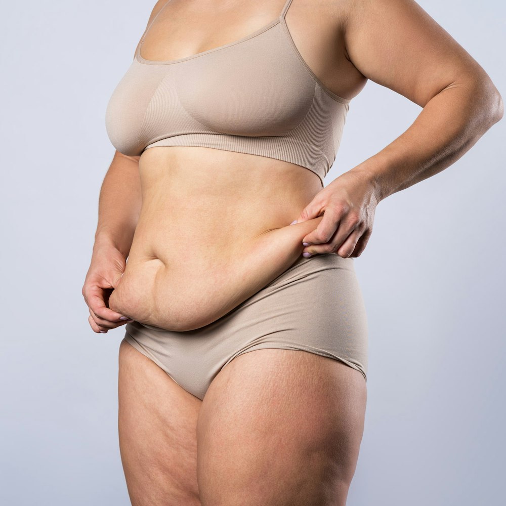 excess skin around the stomach