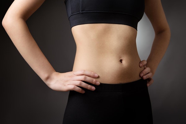Woman with tummy tuck procedure