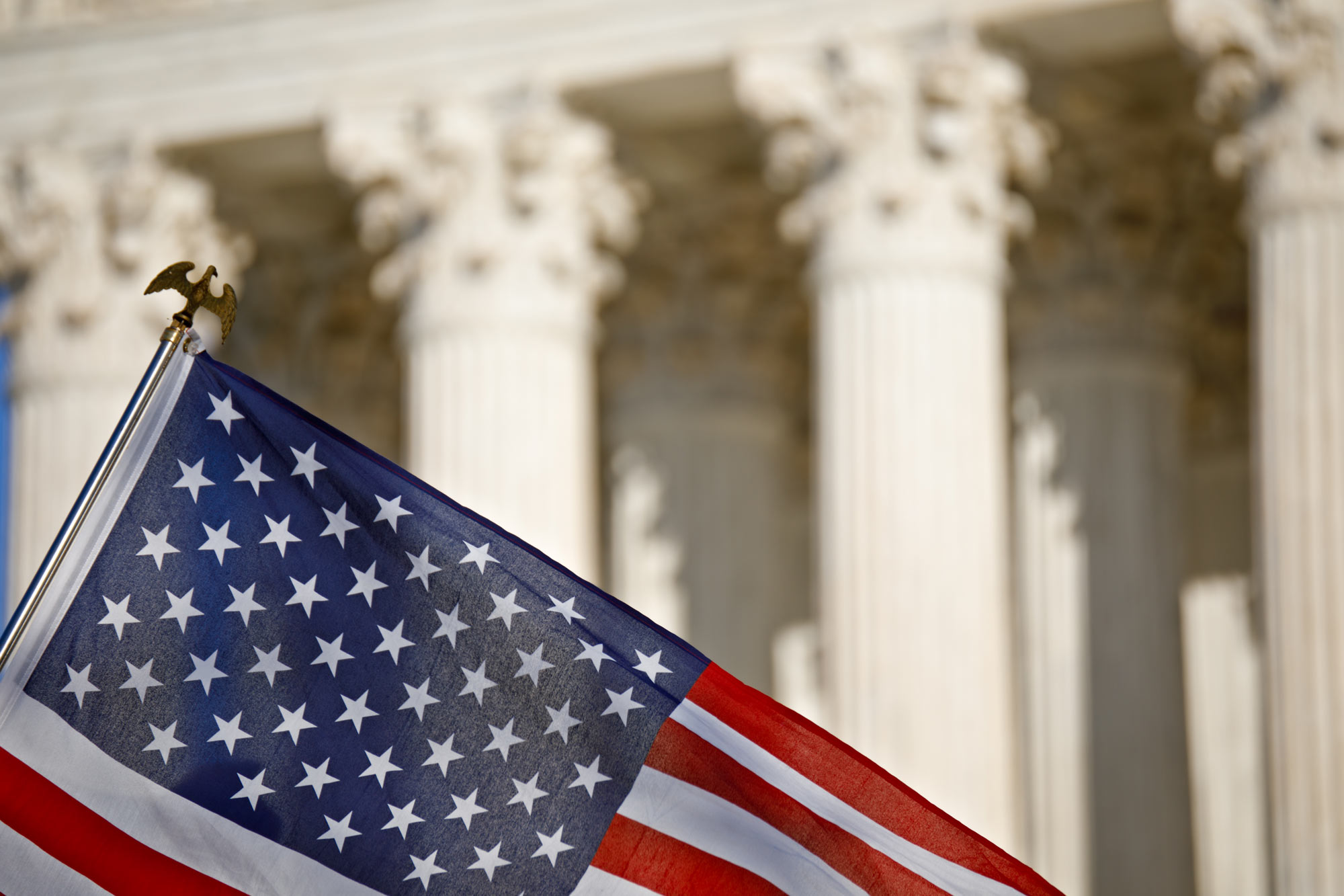 Courthouse with close up of U.S. flag