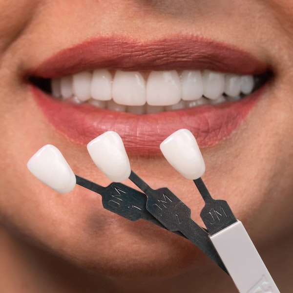 Woman comparing different porcelain veneers