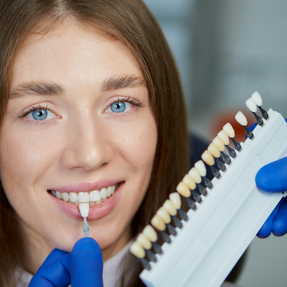 Smiling woman with veneers