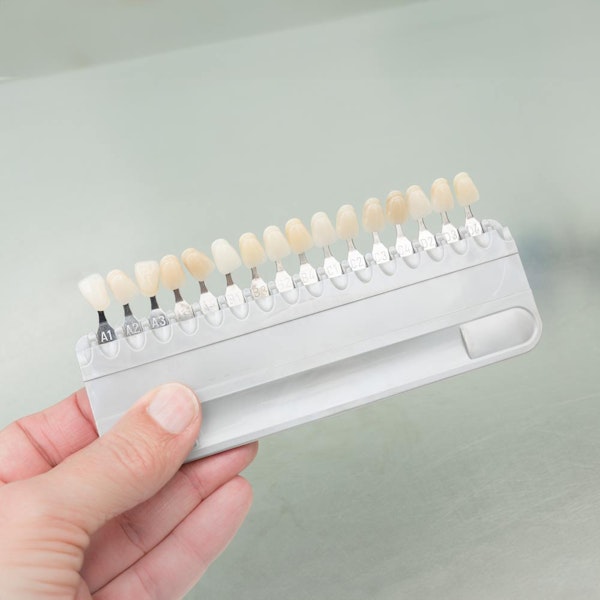 Veneers against green background