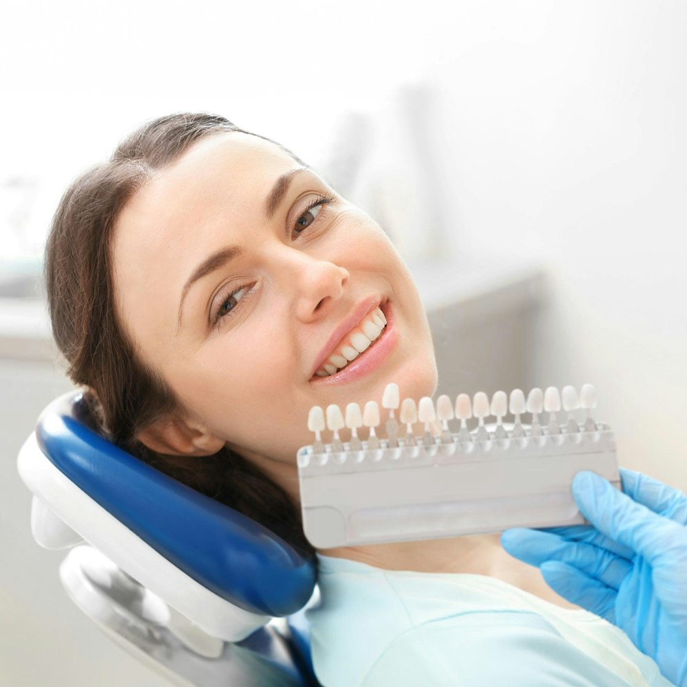 Woman with veneers shades