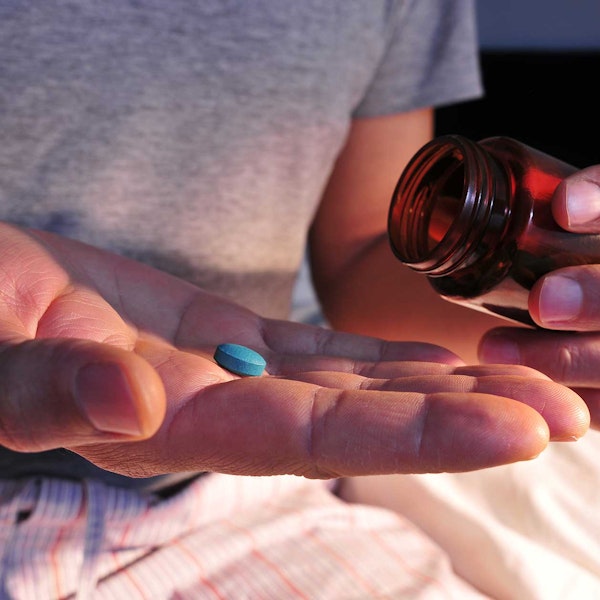 Person taking over-the-counter medications