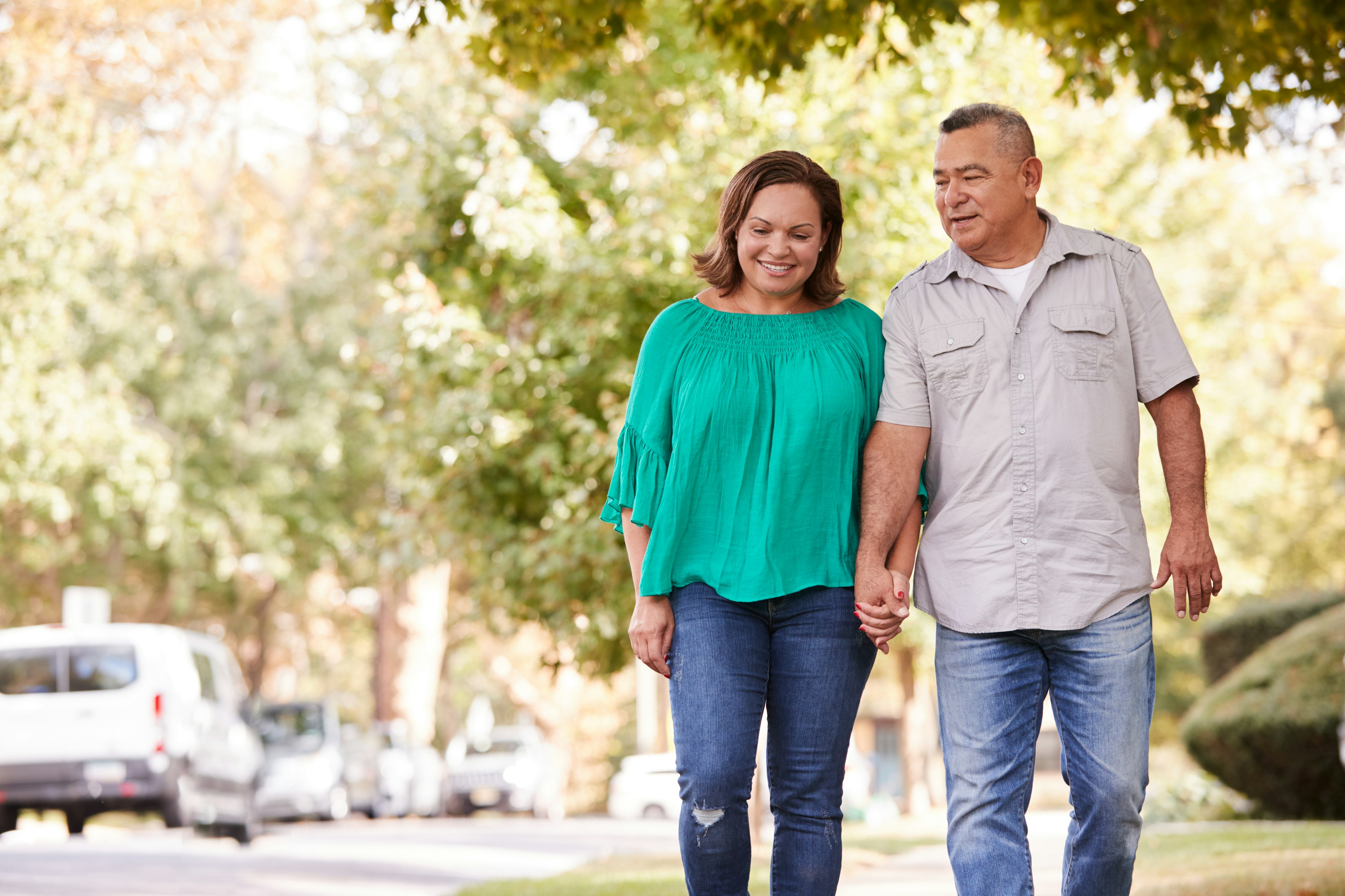 Couple holding hands and walking together